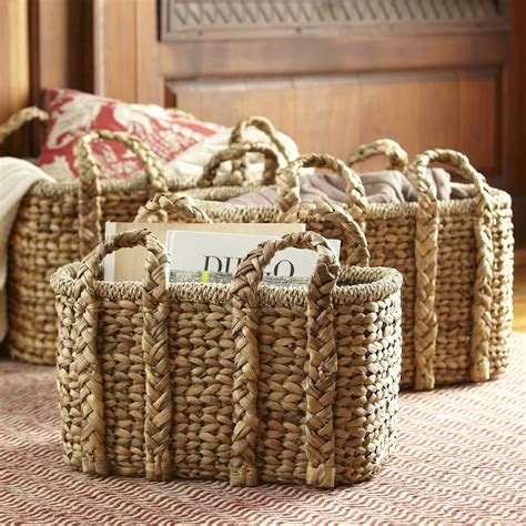 Shop shelf with wicker baskets from Pottery Barn. . Pottery barn baskets